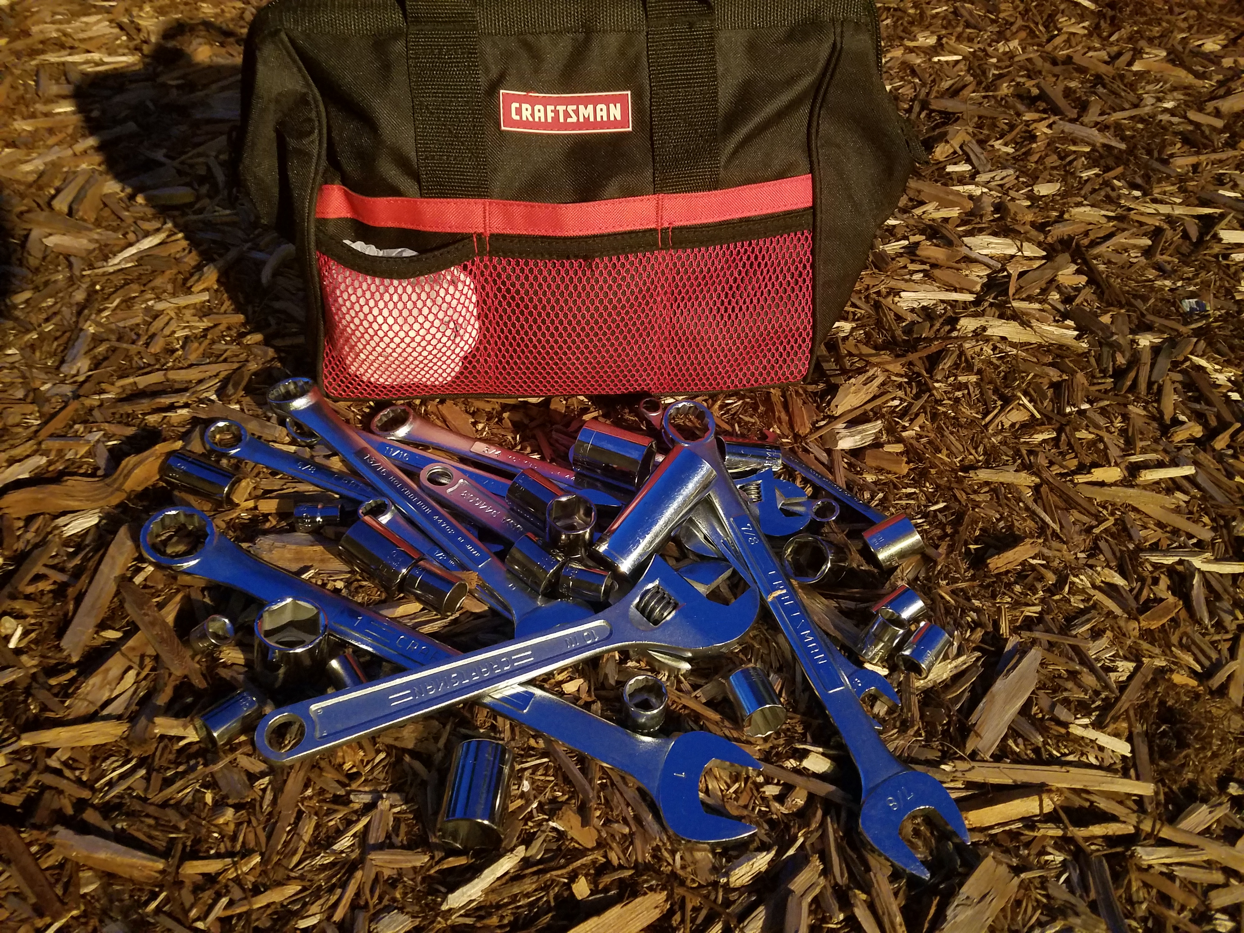 Tools dumped directly on ground.  A good way to lose good tools.