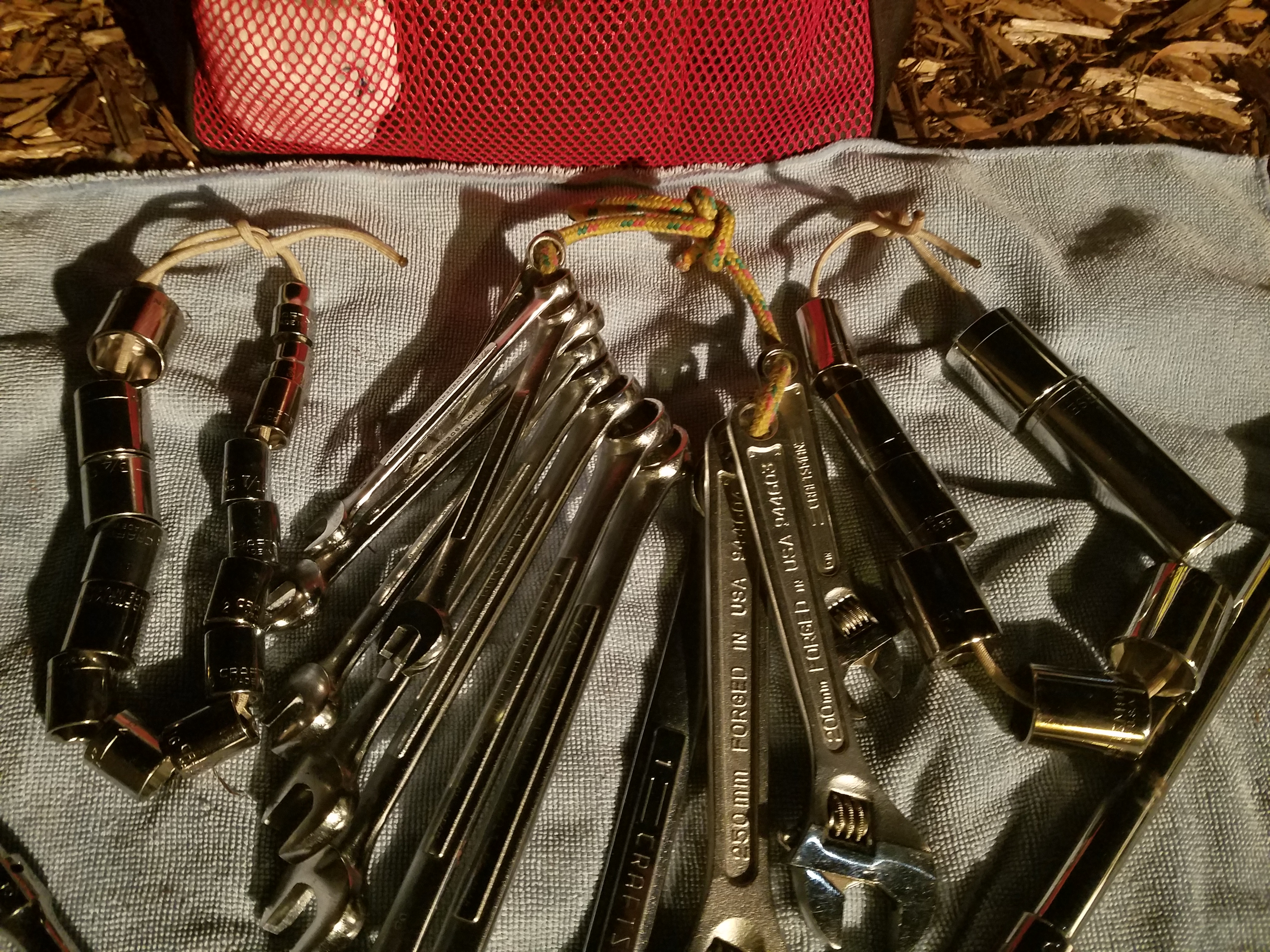 Hack - Rather than just dumping lose tools, run rope or a para-cord through tools to keep them together.