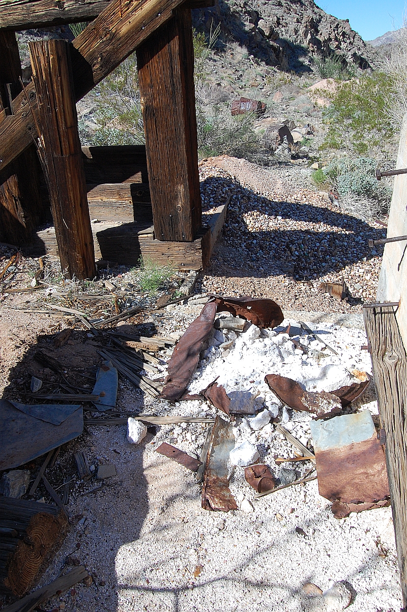 This stuff kills simply by touching it.  It's called CYANIDE.<br />If you see drums, or old pink color sand...stay away.  In the old days , people were not as careful with the environment.