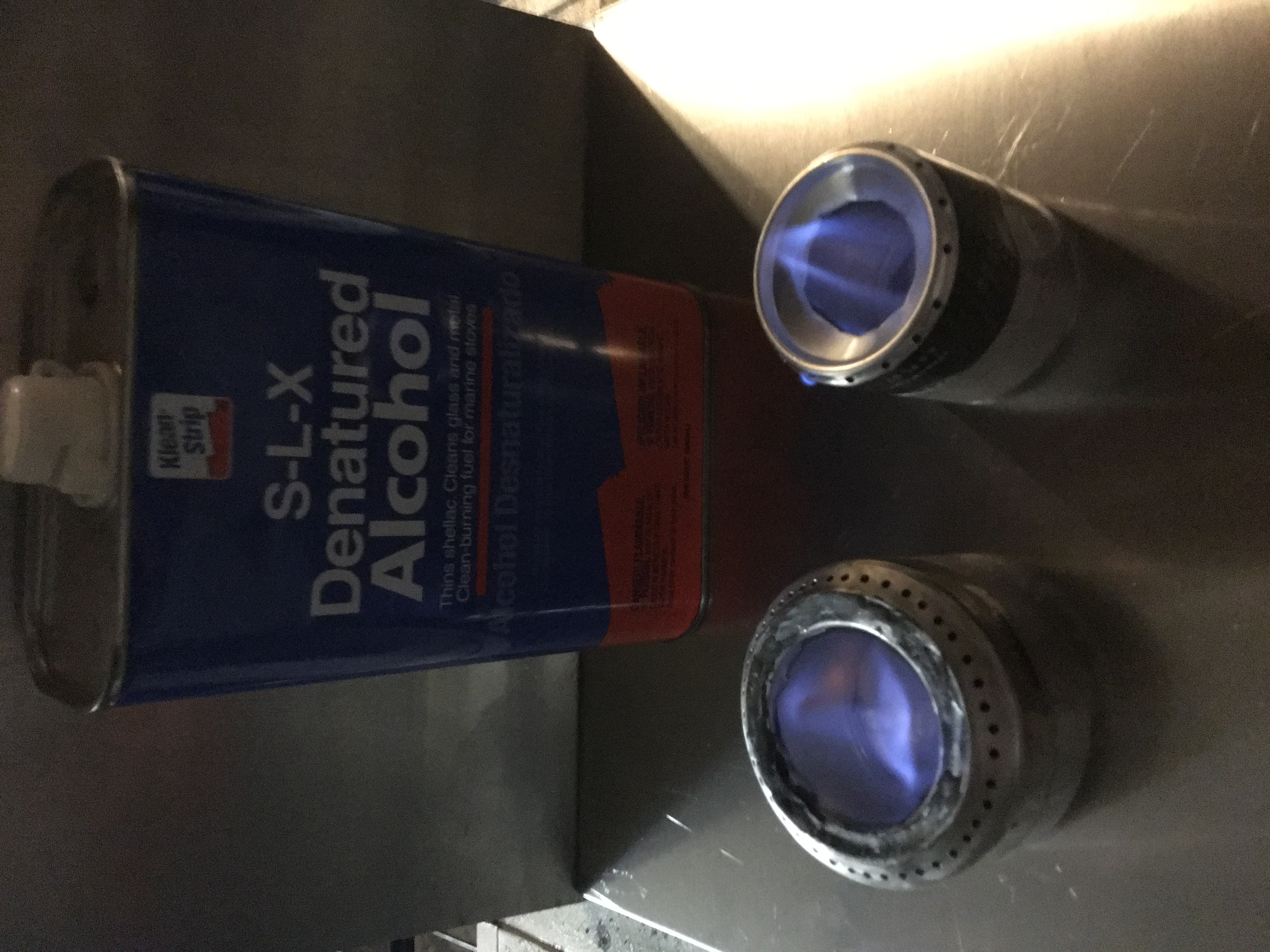Pour in alcohol and Light the stove carefully.