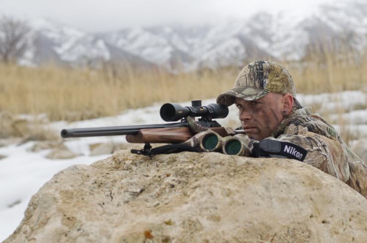 Shooting Sticks Easier on Gear than a Rock.jpg