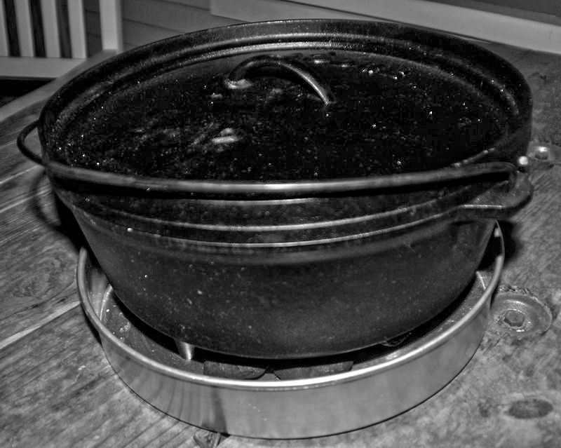 12&quot; Dutch oven nested onto coal bed.  Good for a 10&quot; DO too.