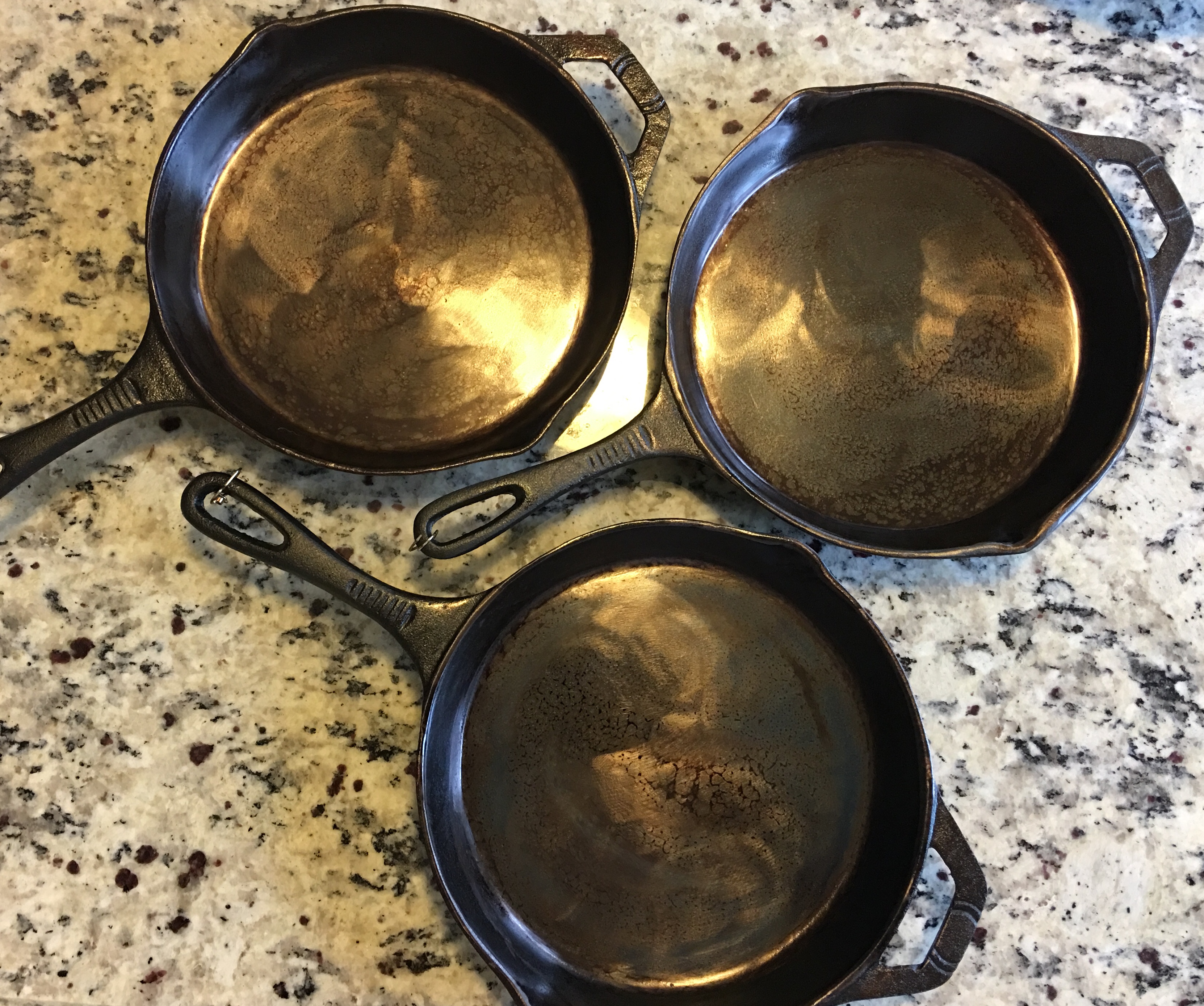 Completed process with 4-6 very thin coats of oil on each pan.