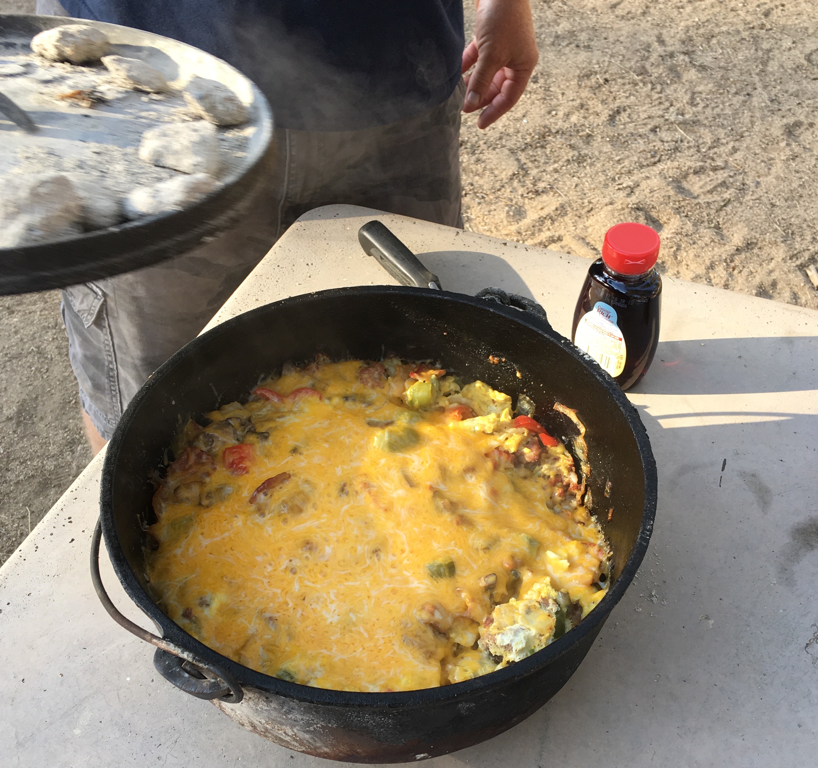 Mountain Man Breakfast- sausage, bacon, onions, peppers, potatoes, seasoning with egg and cheese.
