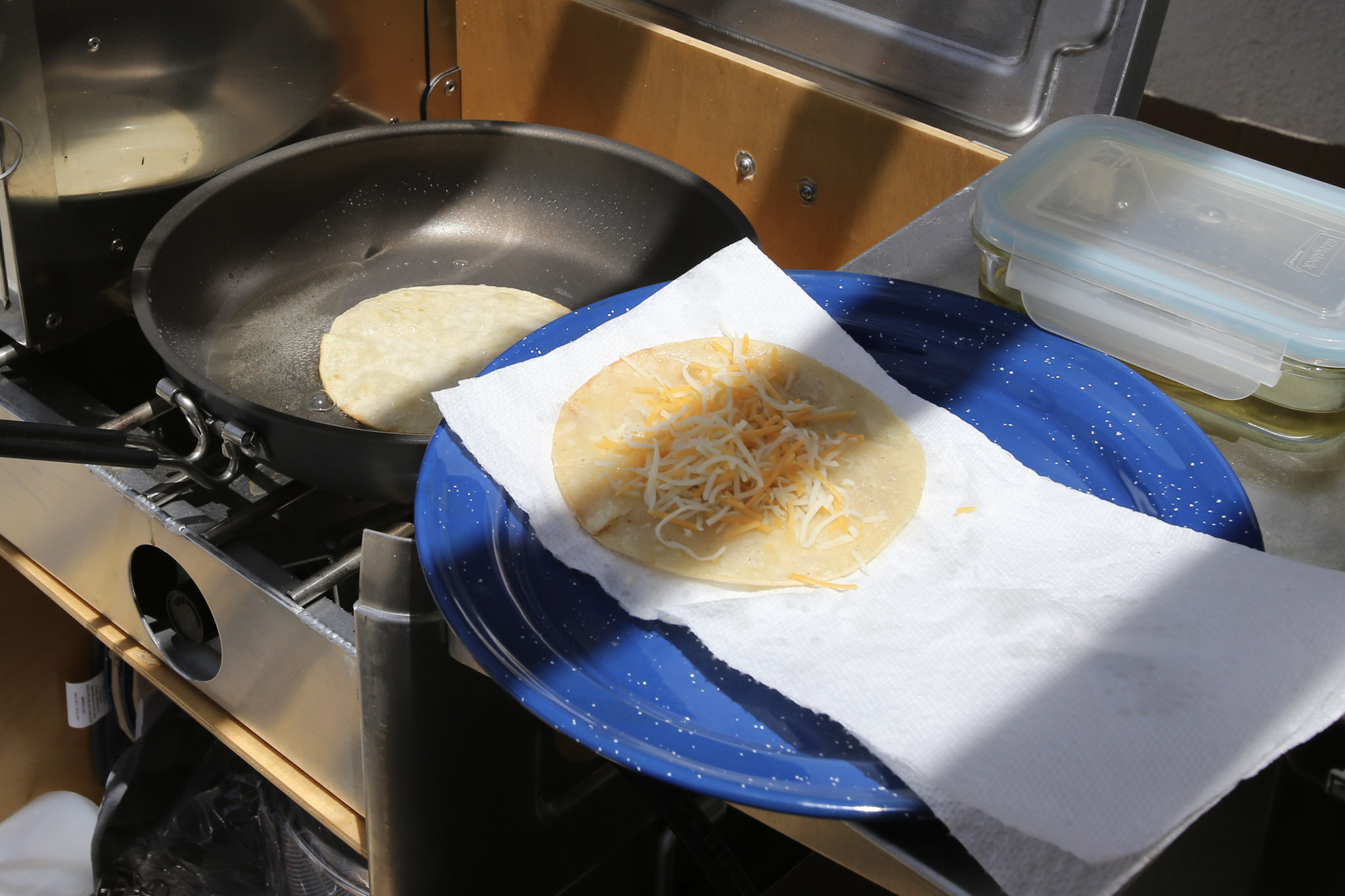 Drain on a paper towel and sprinkle with cheese.