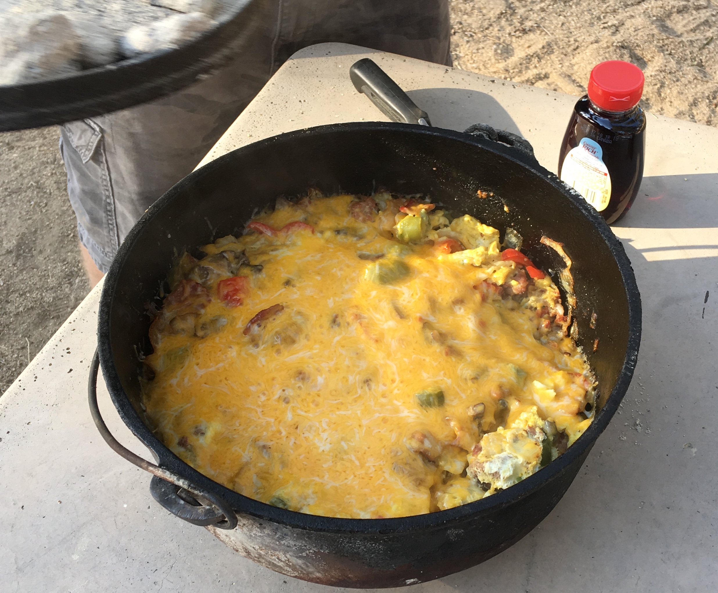 Warren is the master of multitasking and cooks this Dutch oven meal right next to his HF radio.