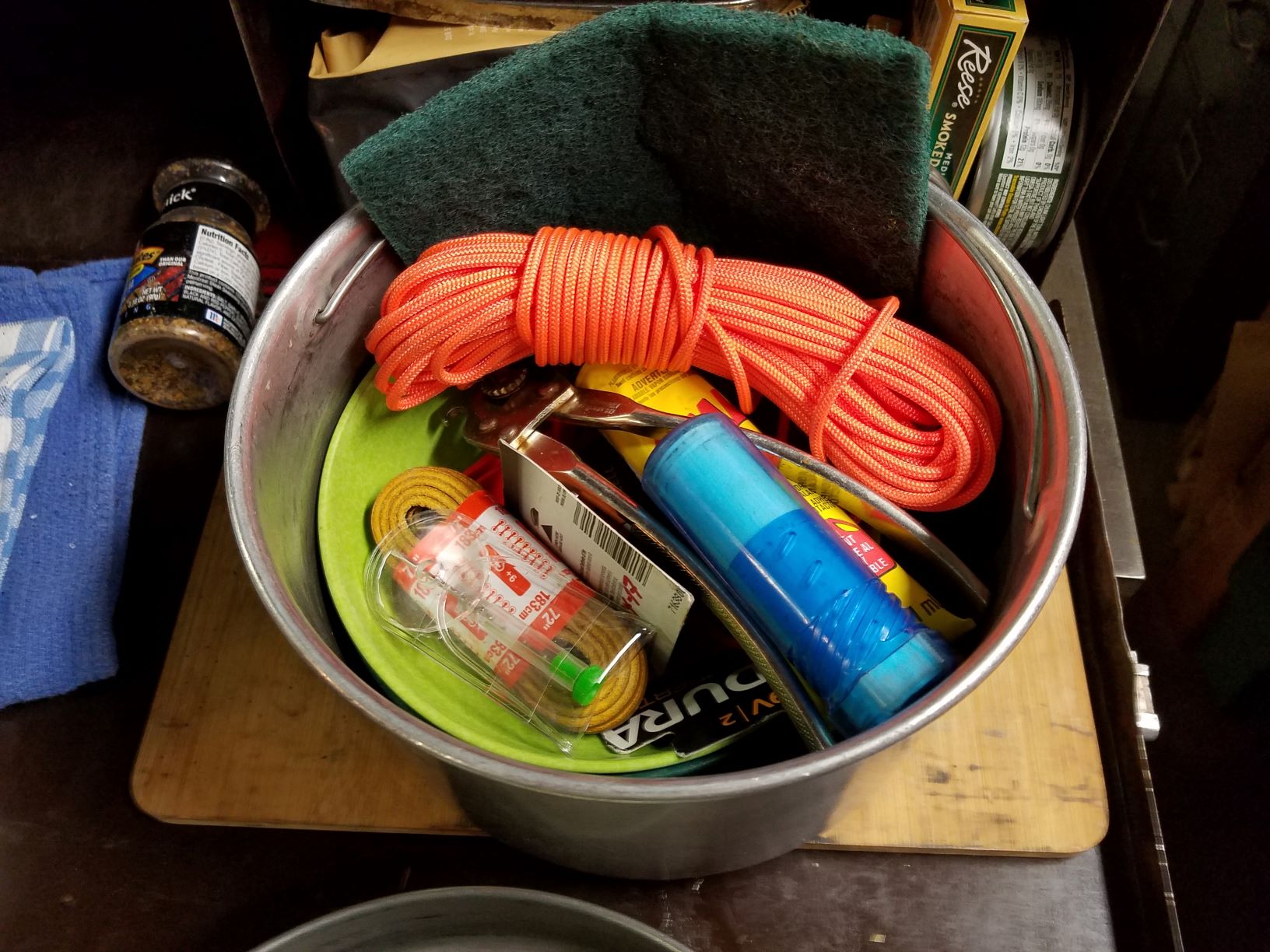 2 bowls and camp repair stuff stored inside.jpg