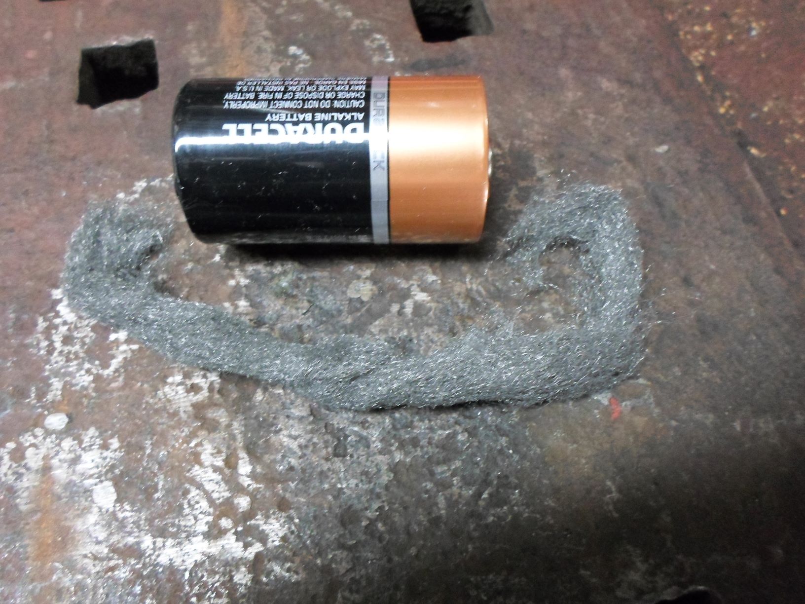 Battery with steel wool.JPG