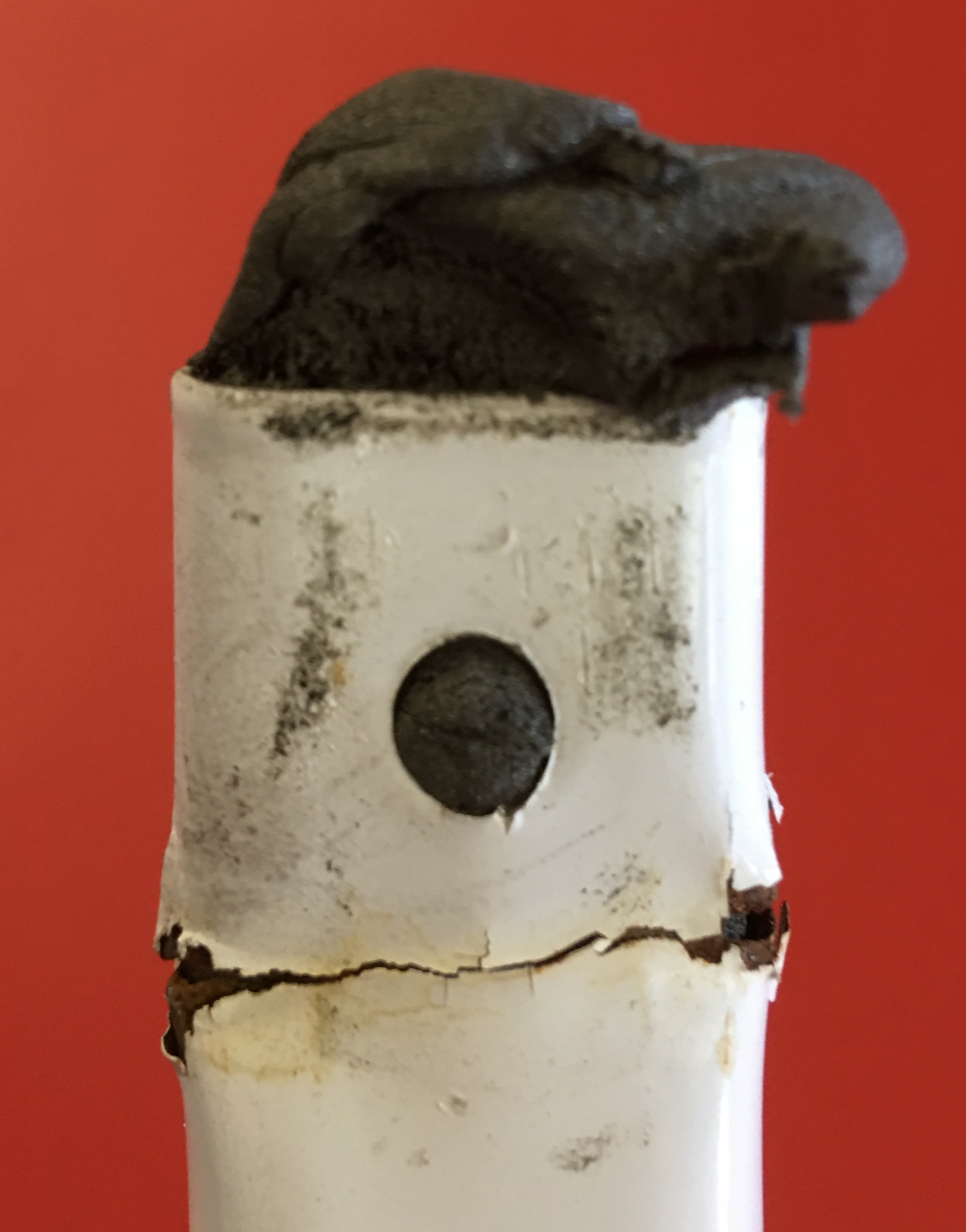 Tear off some putty and thoroughly need using gloves. Stuff the putty in the end beyond the damaged area.