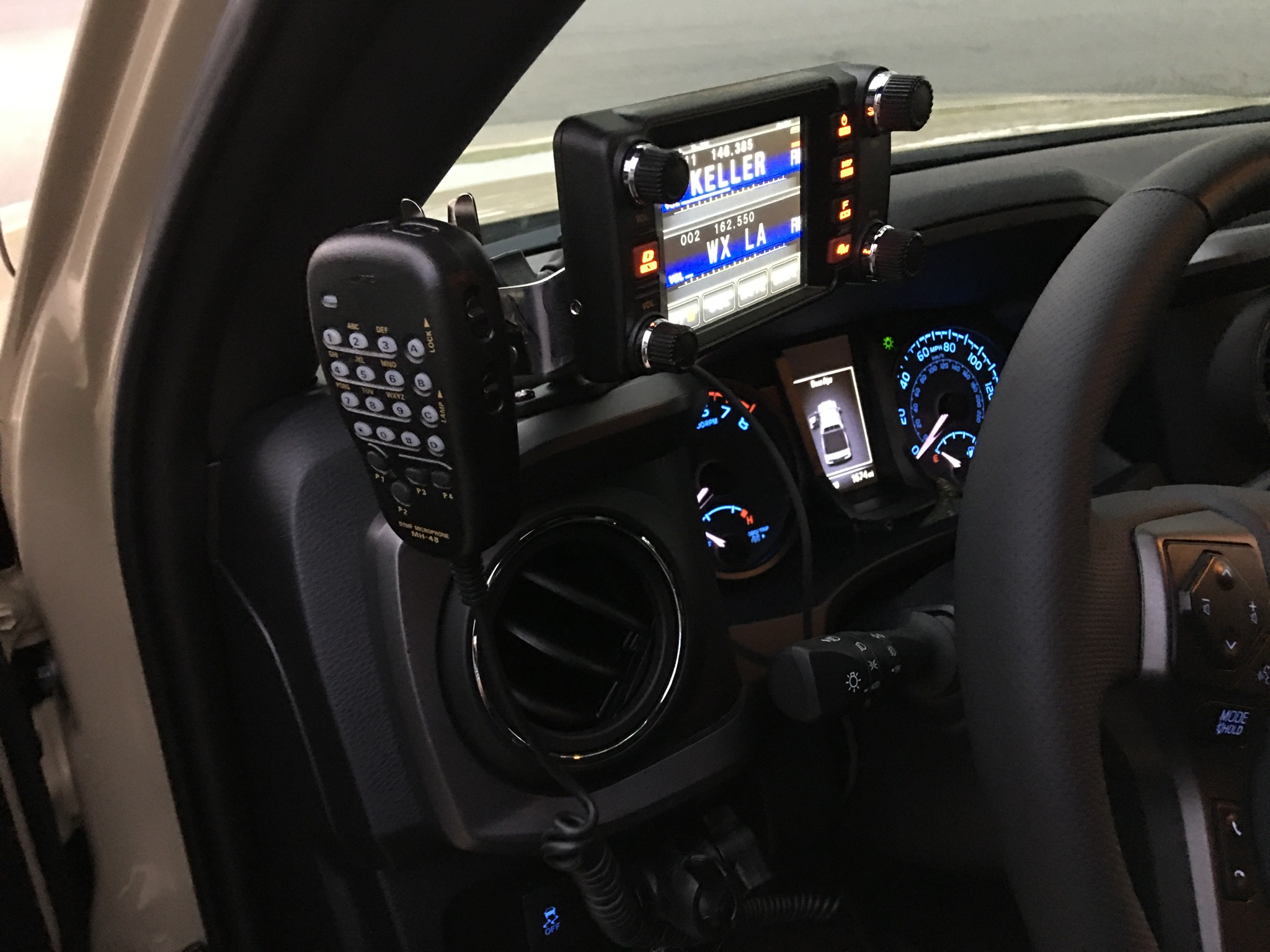 I installed my Yaesu FTM 400 in my new Tacoma. The head unit is installed using a RAM mount on the dash.