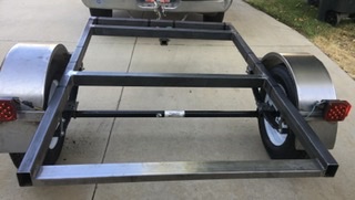This is a legally registered trailer in California. You need a rolling frame with Lights, fenders, approved hitch and safety chains with retainers. That’s it!!!