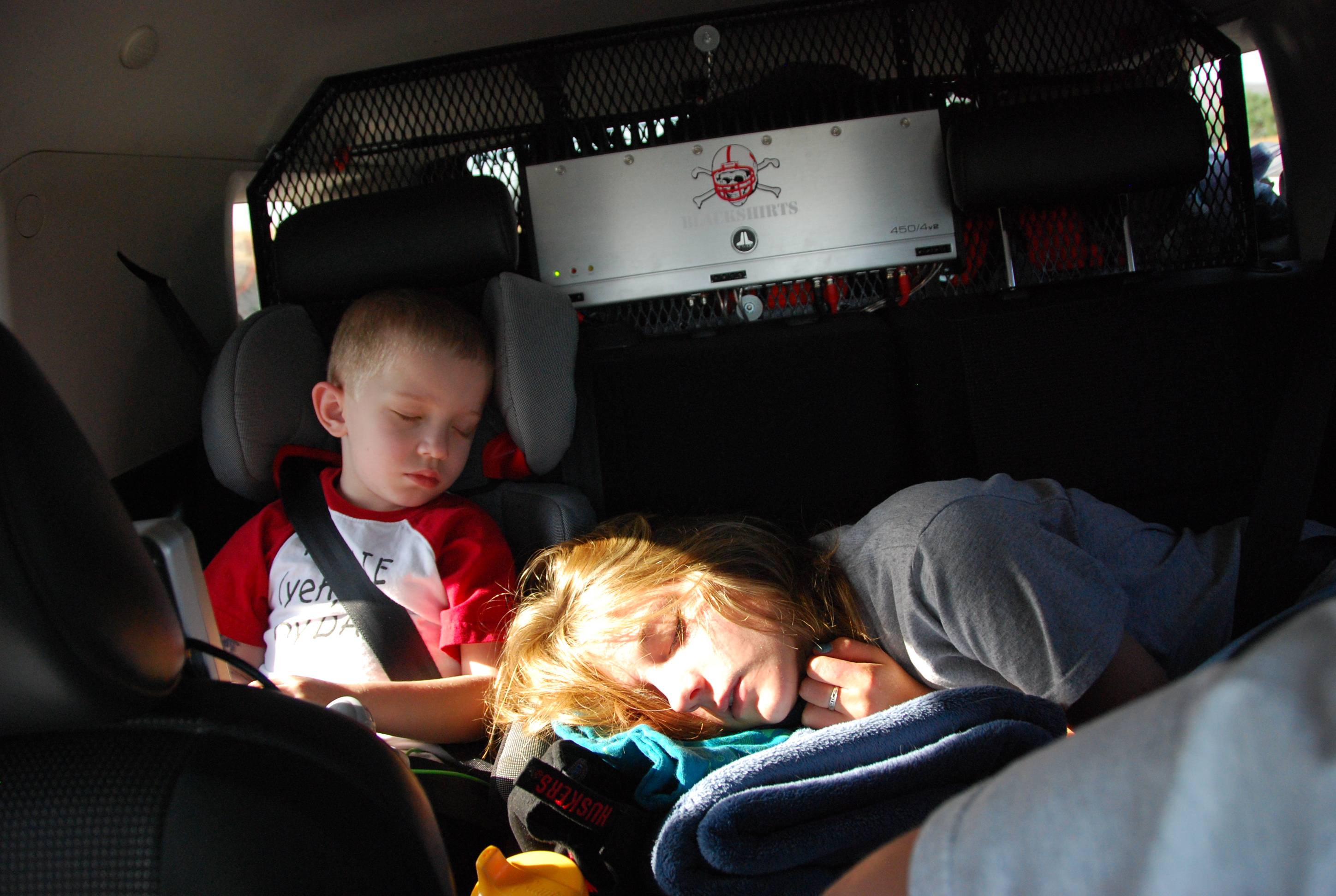 Kids sleeping on the way to trail head.