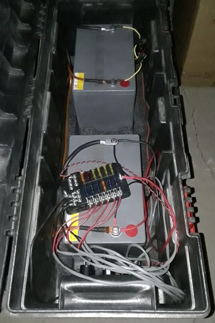 Auto/marine style fused distribution center as opposed to the more common Anderson power strips.
