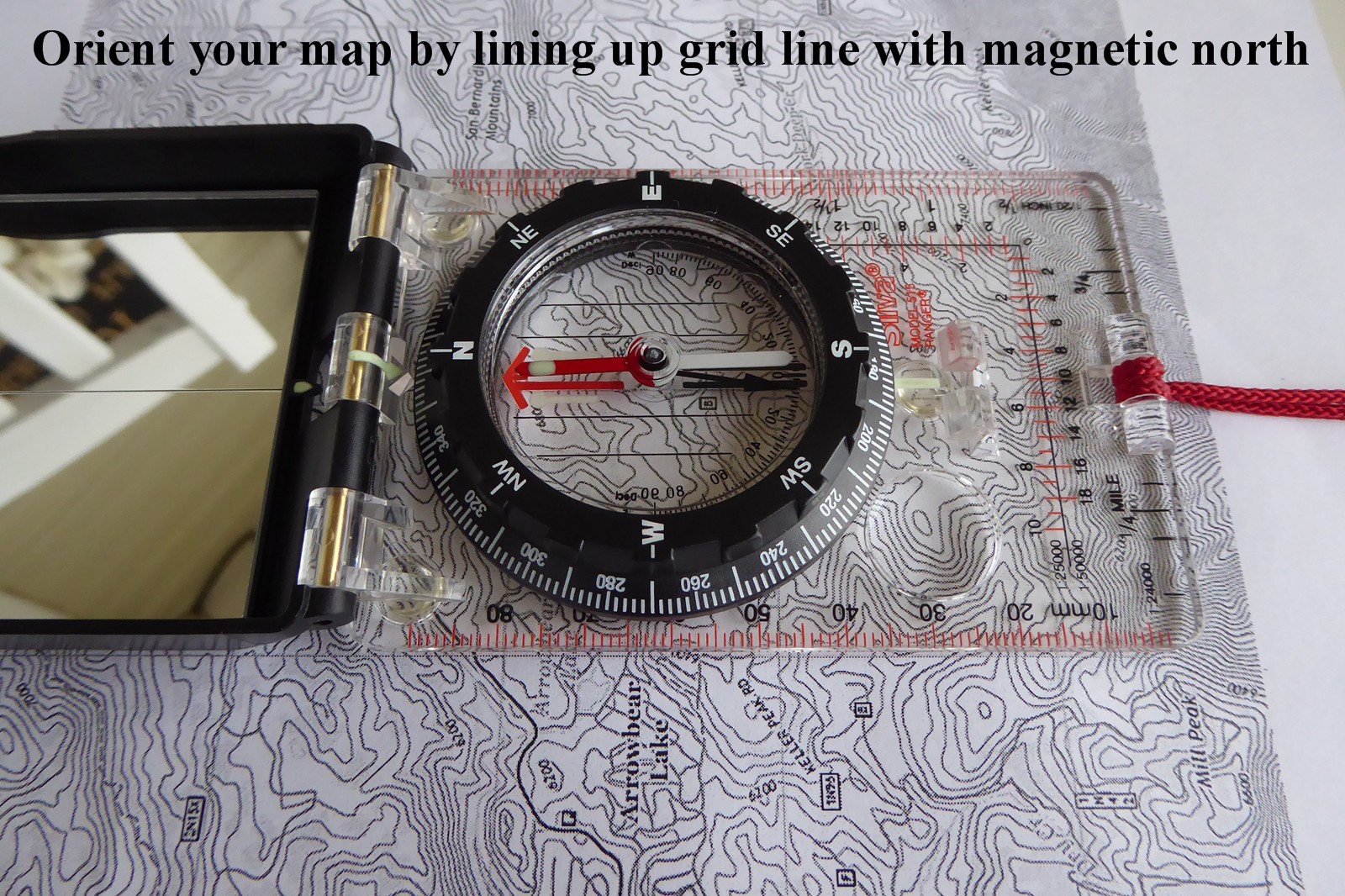 Orient the map by placing the edge or index lines parallel with the compass that is pointing magnetic north and now both your compass and map are oriented and what you see on the map is what you see around you (negates the issues found with the grid-magnetic variance, also known as the &quot;GM angle&quot;).