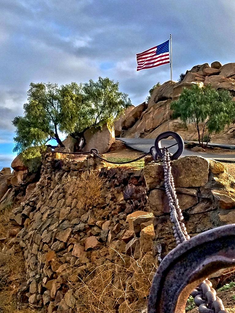 Mount Rubidoux, Ca.  Do you see the signs of a rail?  We have all seen the ore cars and mining equipment left behind as we explore forgotten sites.  This is an example of repurposed ore rail (my opinion not confirmed).  Frank Miller, the man behind the Mission Inn in Riverside, CA; was an avid collector of things.  Be it art, shipyard anchor chains or ore cart rail.  He used these &quot;treasures&quot; to decorate just as much as to save money and build within his surroundings.
