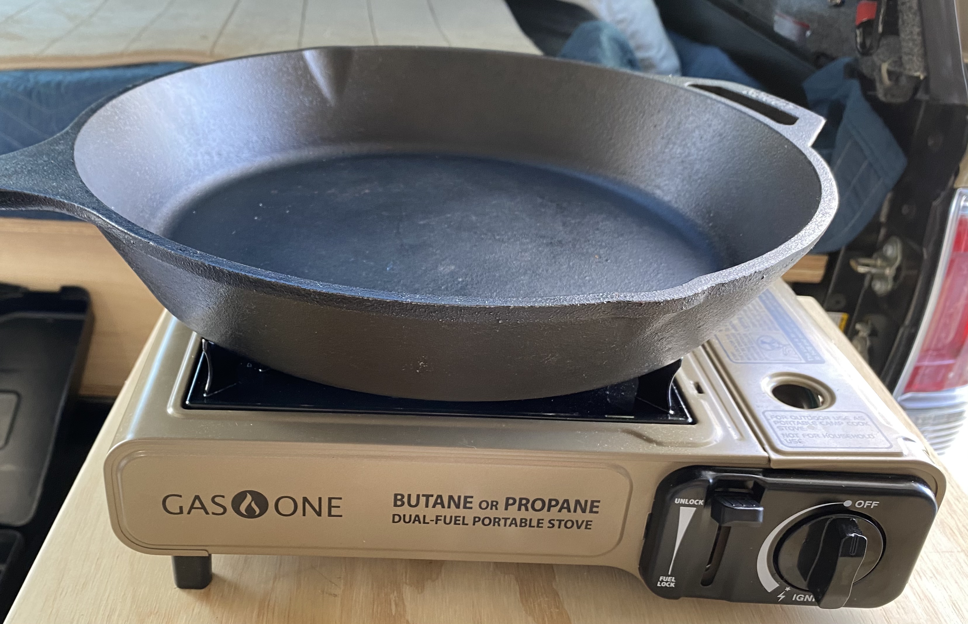 Strong enough to support a 12” cast iron skillet.