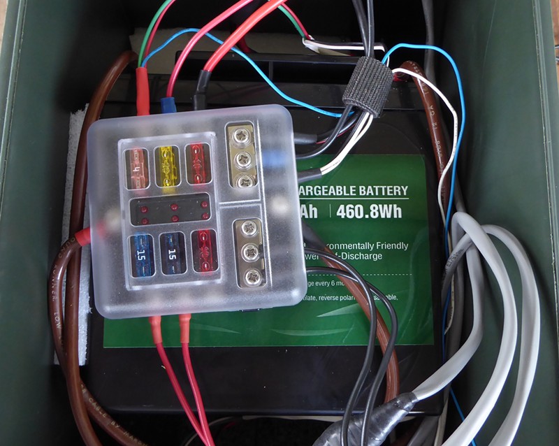 The fused distribution block for all the sockets.  During the change over the terminals poles were reversed and it became a logistical issue putting the new battery in with the existing wire harness.  NOTE:  Leave enough to work with should you need to change batteries down the road.