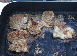 Pecan encrusted chicken with bourbon sauce