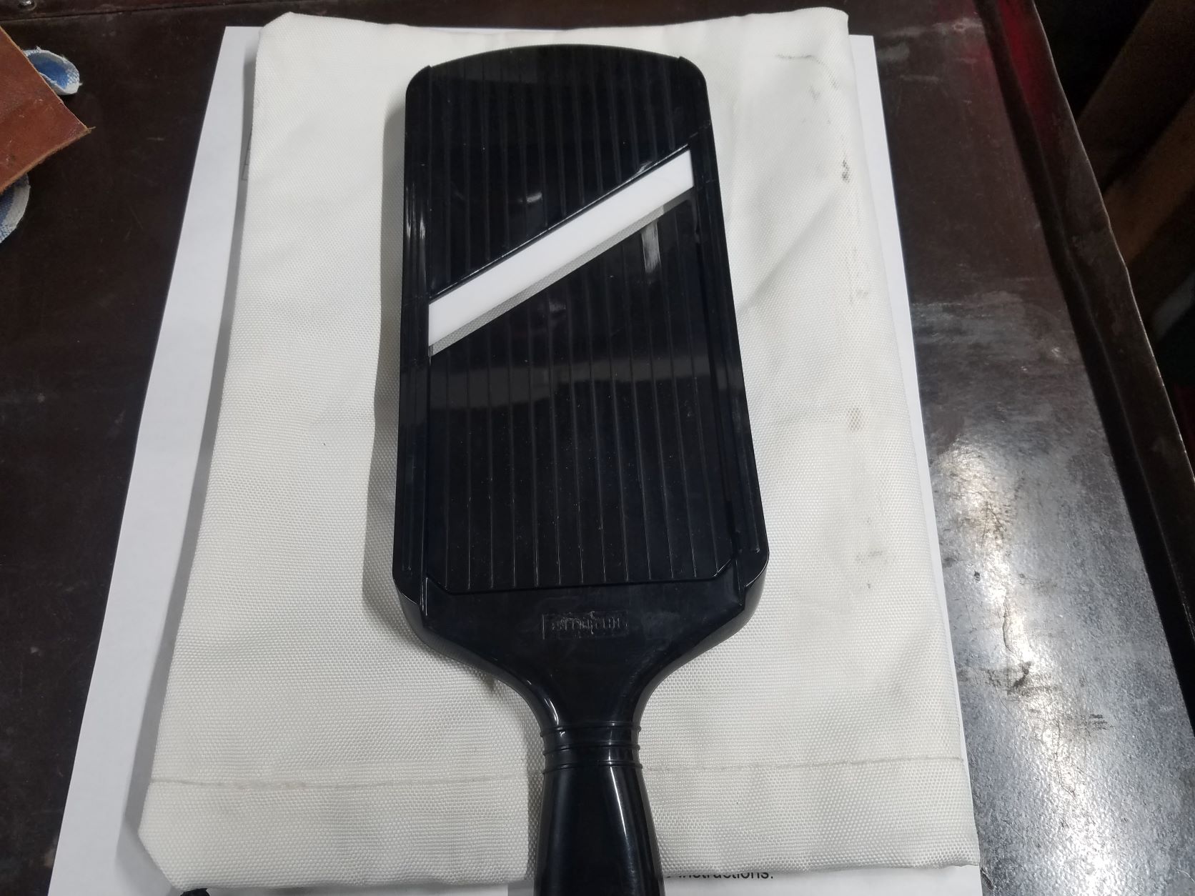 Mandolinne slicer ready to cut your finger.jpg