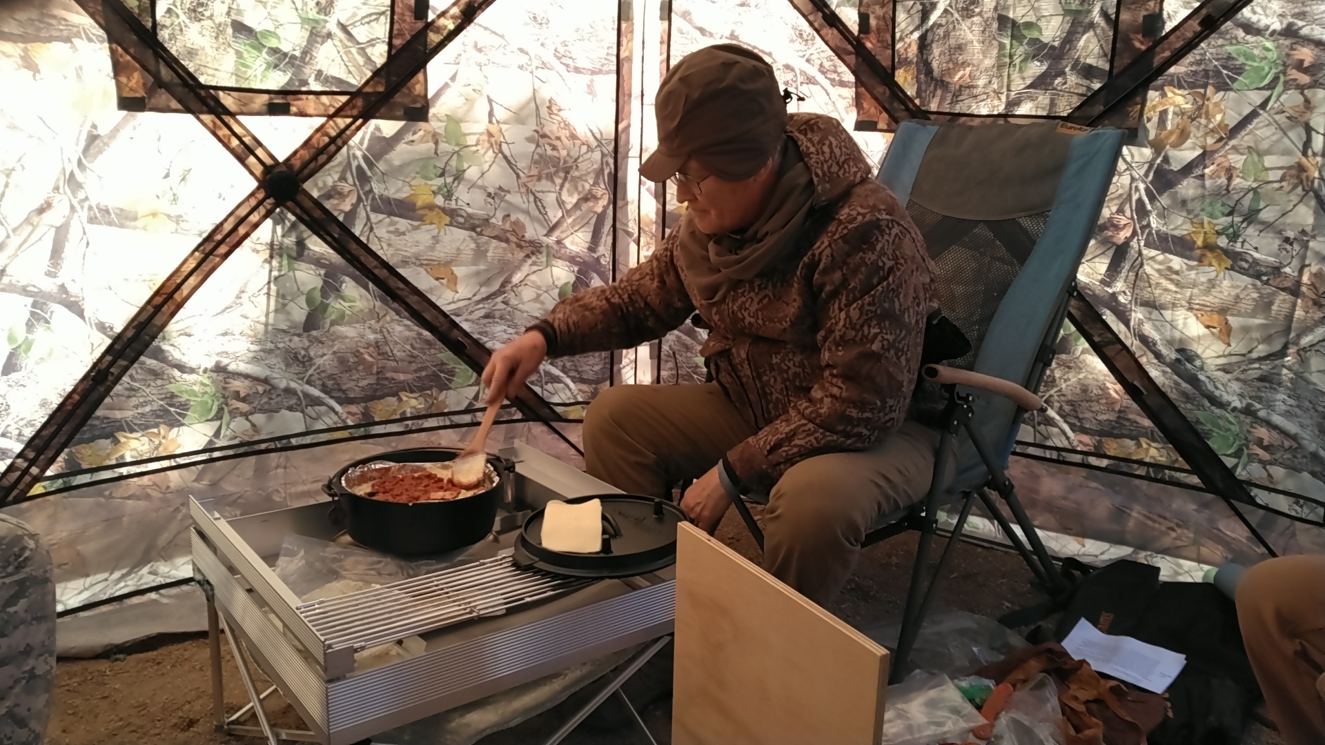 cooking in the shelter.JPG