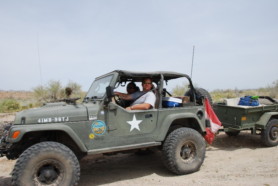 This is one of the TDS board member's TJ. He hasd it painted with surplus military paint and decaled it to look like an old Willy's.