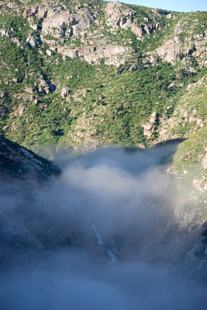 As I approached the descent, the clouds thinned a bit revealing the falls for us.