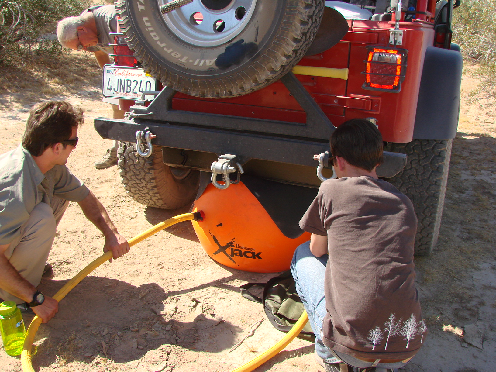 The X-Jack in action changing Joe's punctured tire