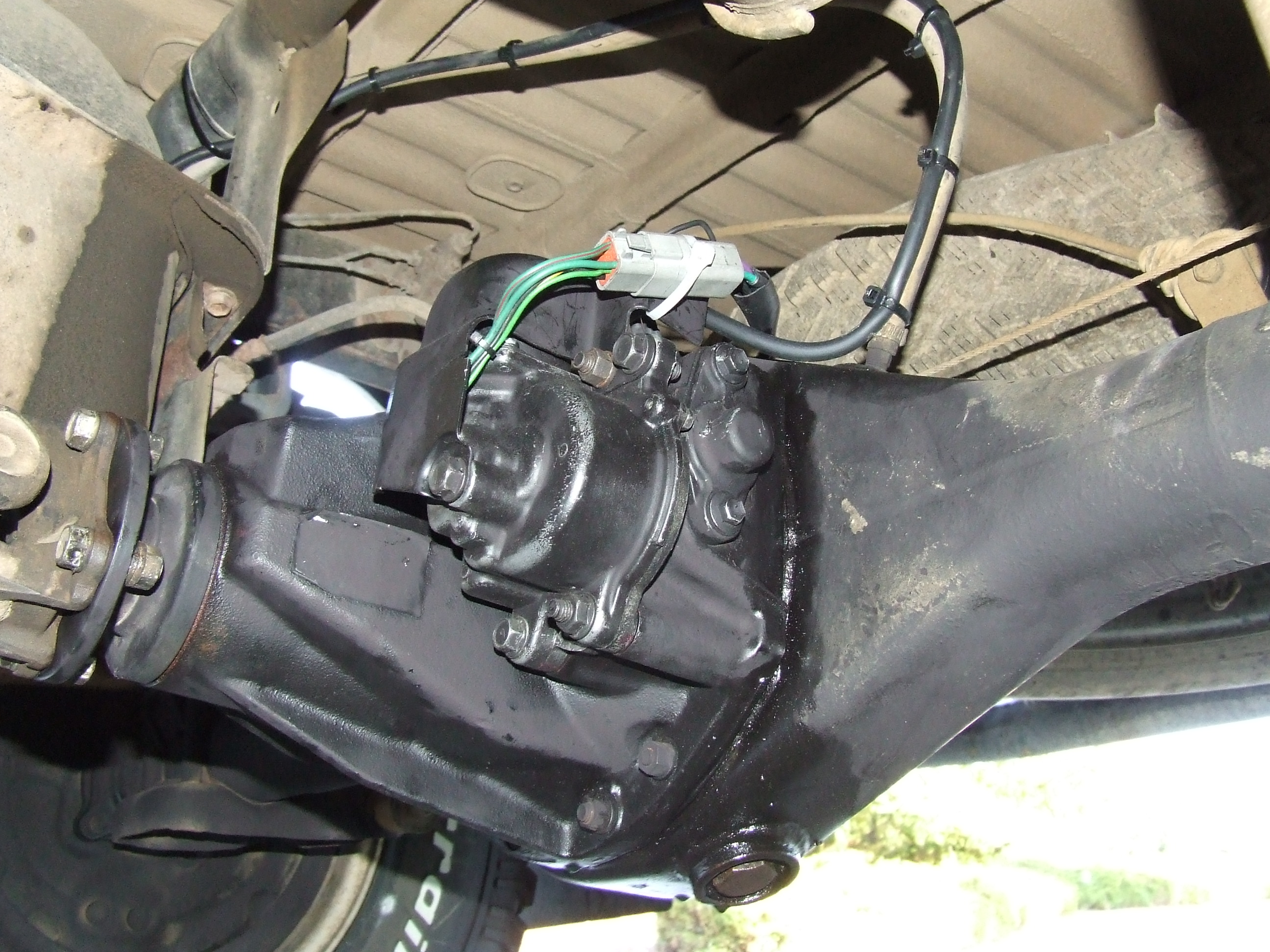 The electric motor vent tube follows my extended diff. breather tube way up high at the gas filler area.