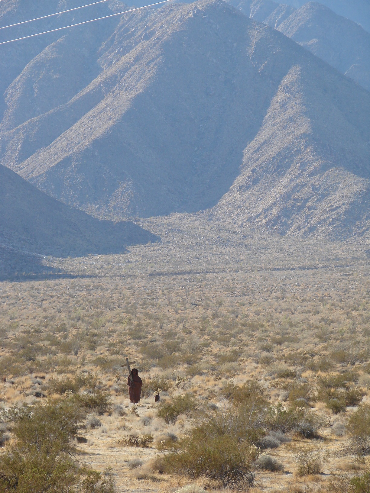 The Father Font and his dog on his way to Font's point...