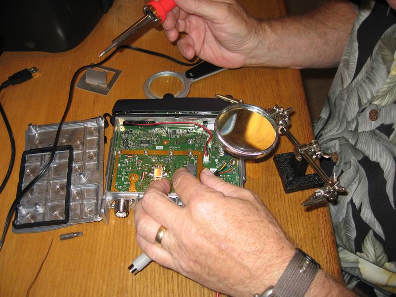 Data port cable is run out the rear of the radio in the power cord opening.