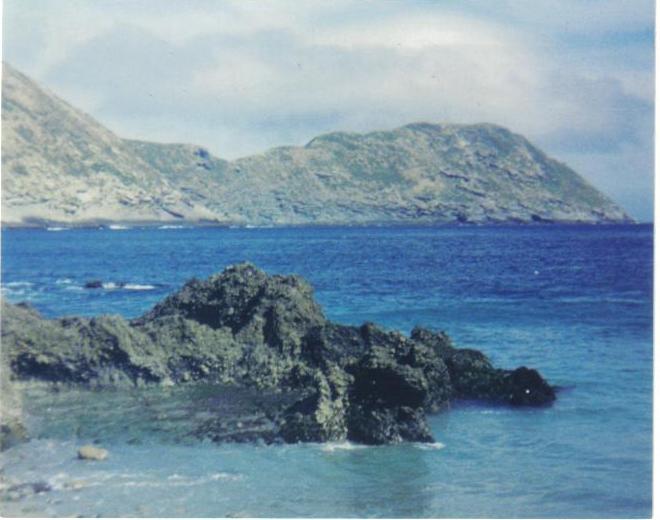 View looking SE from cove in the lee of Middle Island, Islas Los Coronados, Baja California, Mexico. That's the 672' summit of Isla Sur you see at upper right.