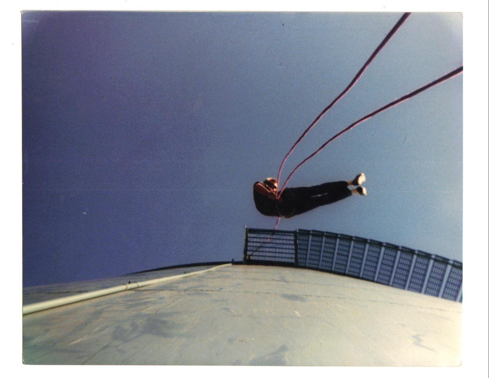 Free rappel practice on the same tower seen in the earlier skateboarding shot, San Diego, CA.