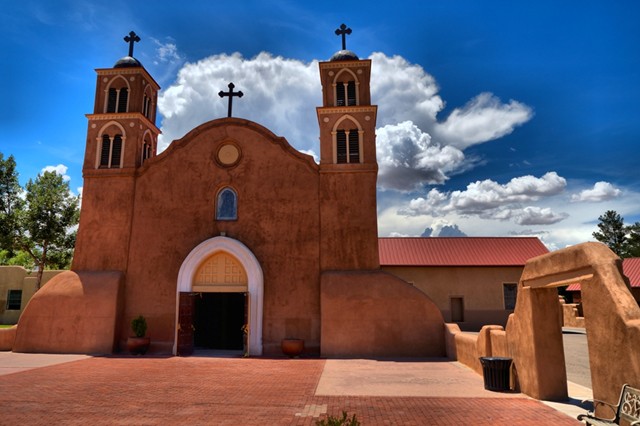 SW Catholic church.  A church I rolled up on in Socorro, NM.  Big, open, clear skies with puffy white clouds simply provide such great backgrounds.