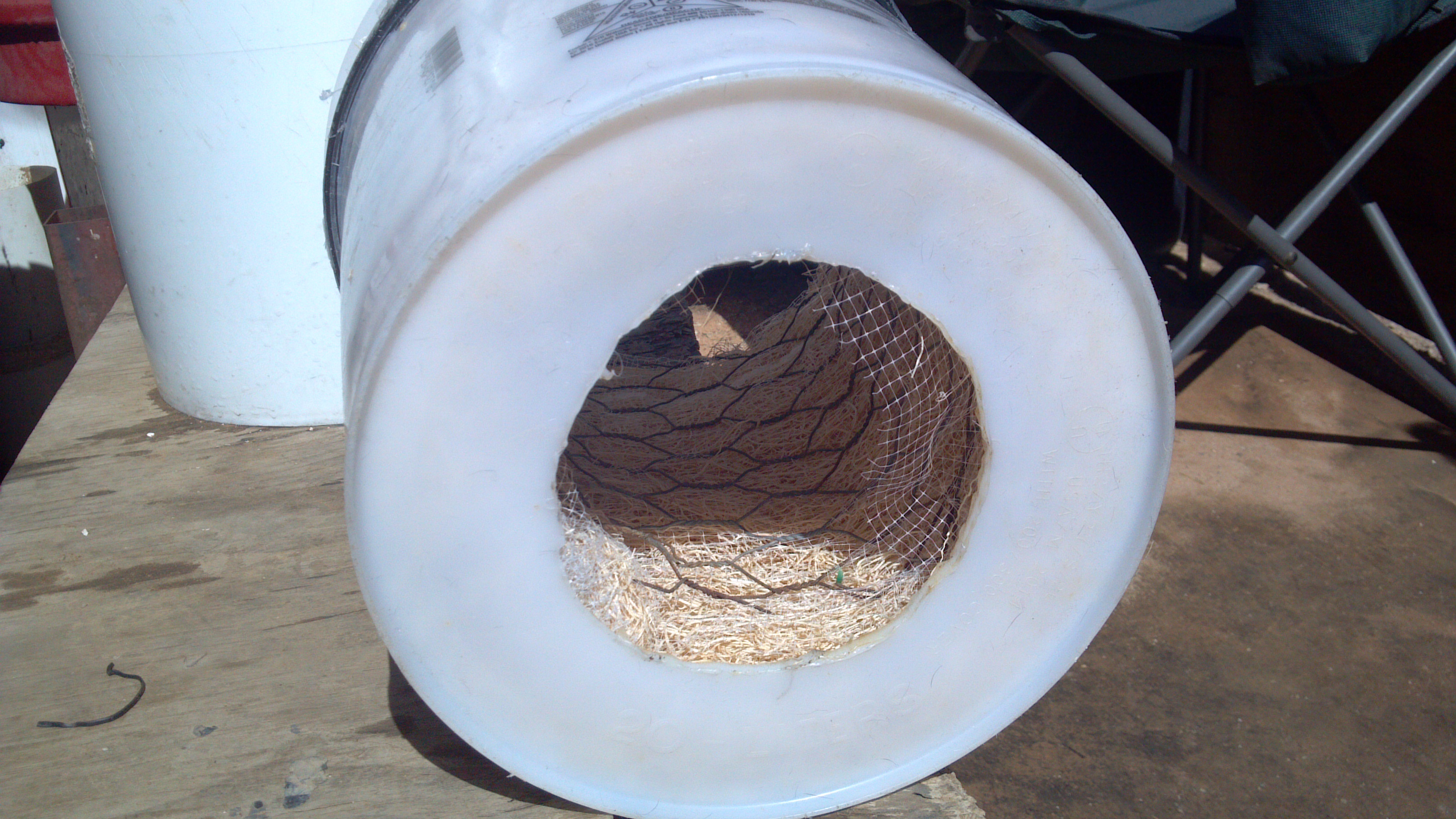 this is a shot of the solar water pump and the Rings to circulate the water on to the cooling pad