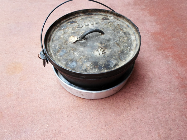 !2&quot; Dutch Oven sitting in the pan/ wind break