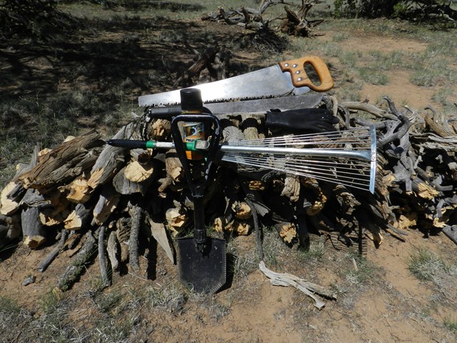 Hand tools for those chores around camp.  Right tool for the job.  The folding rake has been one of the best tools for camp cleanup and easily stored and carried.  The E-tool, USGI machete are a given in our camp.  The saw was nice for a clean cut on bothersome tree limbs.