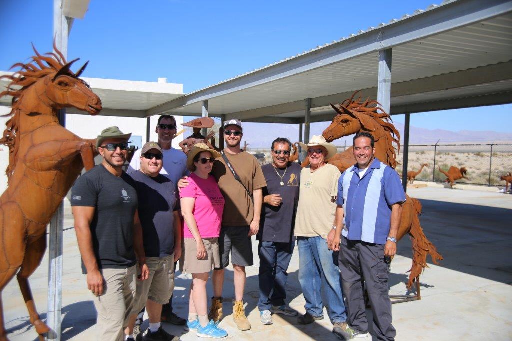 Ricardo Breceda and the Sculpture Tour group at his warehouse in Borrego Springs