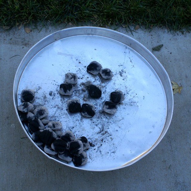 04:  Counting out my briquettes so that the temperature matches the recipe.  When in doubt I use 2 x diameter of oven.  Divide by 4.  1/4 under the DO the rest on the lid.  12in x 2 = 24/4 = 6...6 coals under and 18 on top as a rough estimate.  There are other techniques...make one your own.