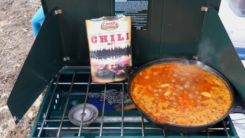 8.	Camp Traditions Chili Mix (one example) that I give two thumbs up to.  For those non-technical chefs.  Brown some meat of your choice then follow the directions on the back of the bag...that simple.  Add some tortilla chips and cheese to get frilly and you have a meal that will fill the belly!