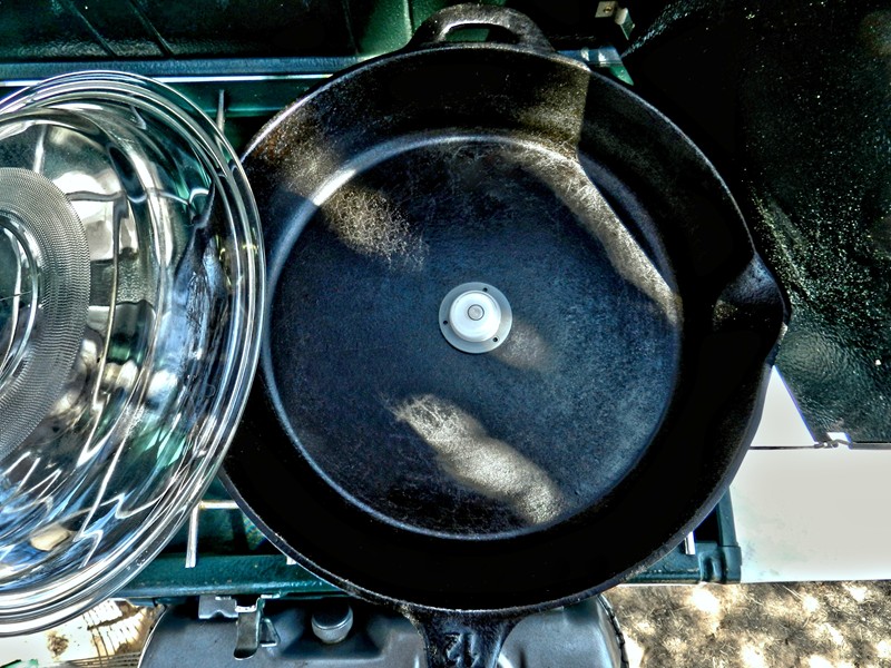 3.	My cast iron 12&quot; skillet on the grill after using a level on the table and stove.  Once I think I'm good I do the final check with the center level.  I dislike my food running to one side of the pan when I cook!