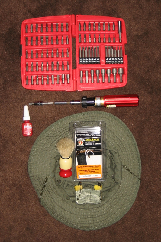 As discussed, safety pinned earplugs, torque drive, thread lock, bits and a bore snake.