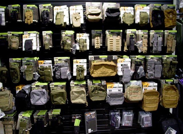 09  Pouches to put your stuff in.  Great PALS system for use on MOLLE gear.
