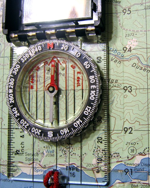 Orient your map either grid north or magnetic north depending on what you are solving for.