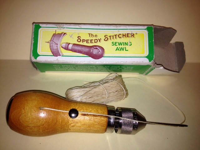 Speedy Stitcher is available at many sporting goods stores. Great for heavy duty repair of camping gear for about $20.