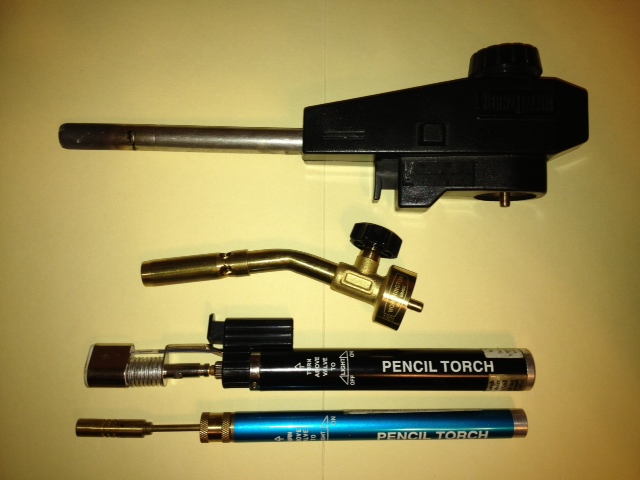 Propane torch head. If you are using 1lb propane bottles to cook with, it makes sense to include a burner head. Start a campfire, remove a seized fastener or assist in bending that bumper back in place. $15-$30. Small butane torch. Refillable and burns hot. Some include soldering heads. $3-$30. Most tool or hardware stores.
