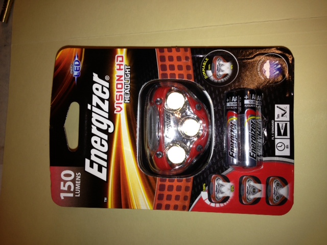 Headlamp. $15 at Walmart. I have a few of this model. Very bright but dimmable.  A must have around camp or on the trail. Many variations. I like ones with directional adjustment. Highest quality models available at camping stores such as REI.  $5-$70