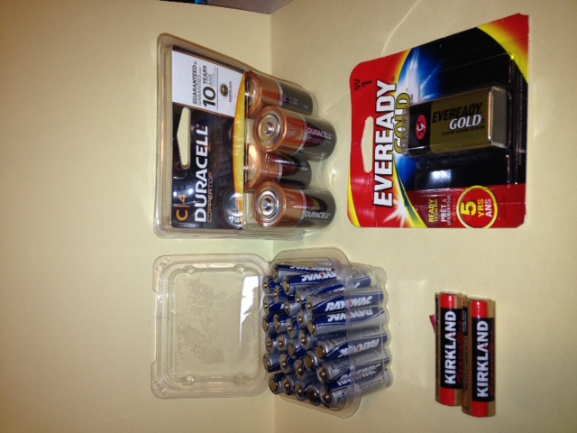 Batteries. Lots and lots. The Kirkland brand has a Consumer Reports best buy rating. Get lithium batteries for critical use. Look for electronics that use the same size battery.