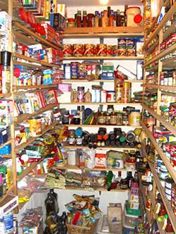 At home you can store as much as you want. Build up to 3 months after that it is individual preference how far you go.