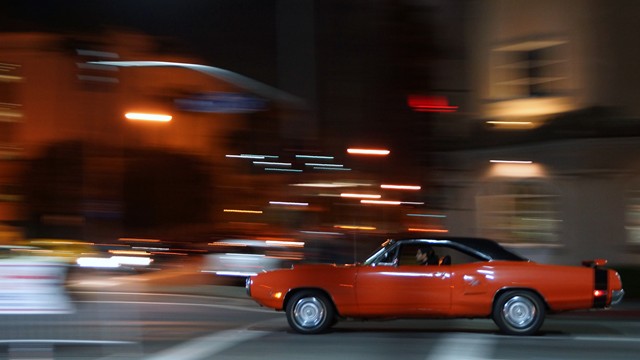 Panning to capture the action in low light with pushing the ISO a little to do this all handheld.