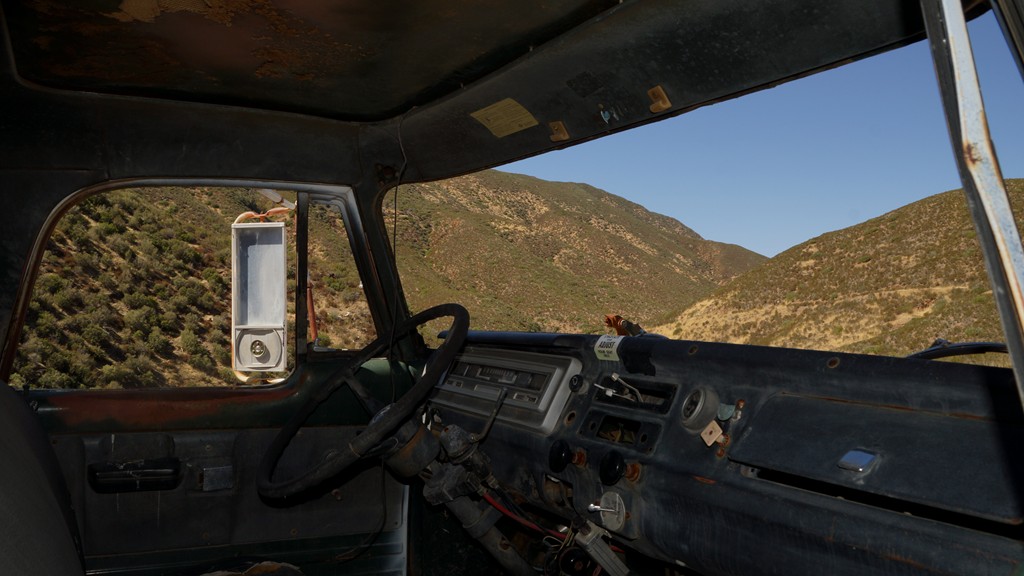 The scenic view from the passenger door of an old dump bed.